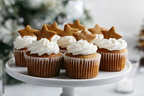Cupcakes With Whipped Cream and Gingerbread Stars on a Display Stand During a...