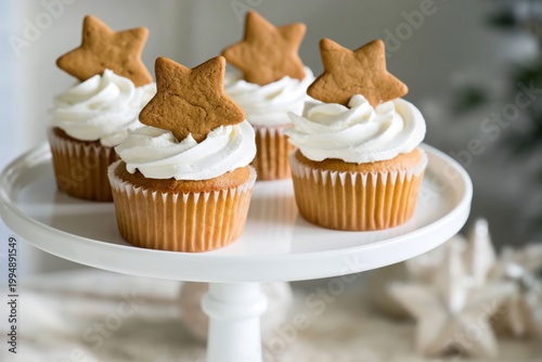 Cupcakes With Whipped Cream and Gingerbread Stars on a Display Stand During a...