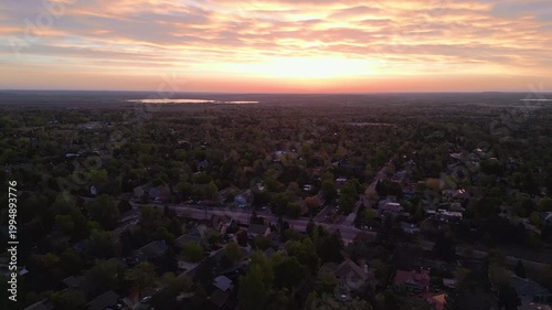 Sunrise over the neighborhood with trees in boulder colorado 