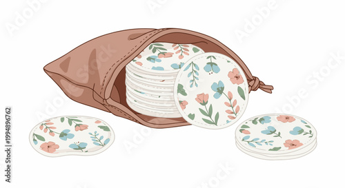 Soft, reusable rounds with delicate floral patterns are gathered in a small drawstring pouch