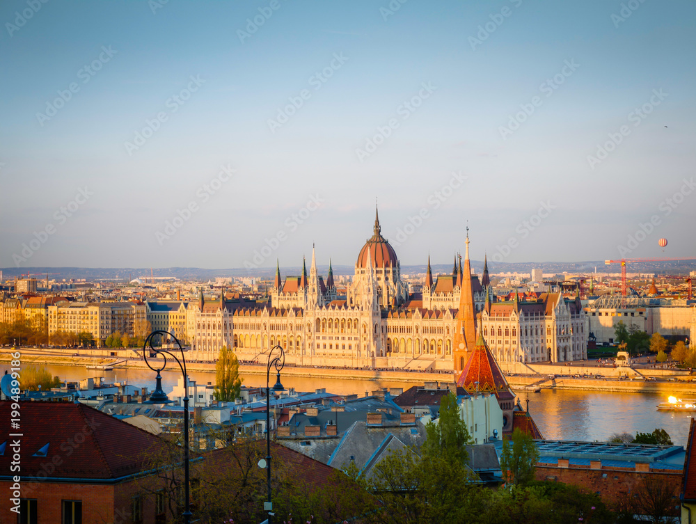 Fototapeta premium Hungarian Parliament Building, Parliament of Budapest. Aerial drone view of Budapest architecture, stunning historic building. Sunset and golden hour
