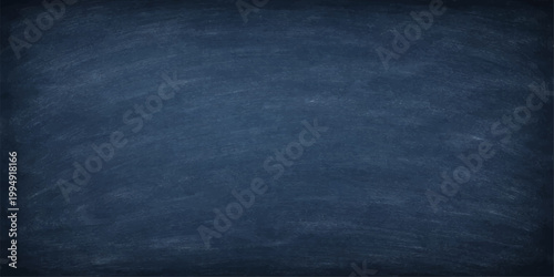 Abstract image of a textured blue chalkboard, perfect for presentations, educational themes, or creative backgrounds. 