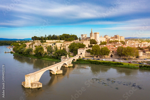 Obraz na płótnie Beautiful view of Avignon with famous bridge Saint-Benezet, medieval architecture along the Rhone River in Avignon, France