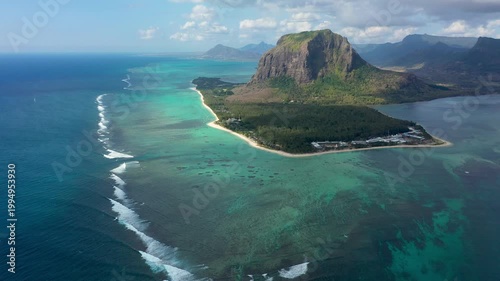 Aerial view of Mauritius island panorama and famous Le Morne Brabant mountain, beautiful blue lagoon and underwater waterfall. Le Morne Brabant peninsula and Underwater Waterfall, Mauritius.