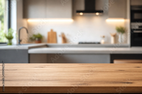 wooden top table with blurry background kitchen area