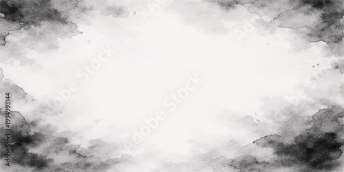 Dramatic dark storm clouds gather in an overcast summer sky with a hint of blue light breaking through the nature cloudscape