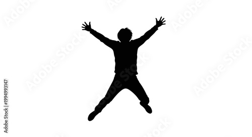 Silhouette of a person jumping with arms outstretched in the air