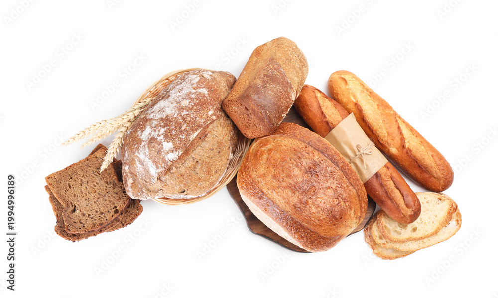 Fototapeta premium Different types of bread and spikes isolated on white, top view