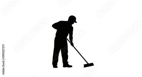 Silhouette of a man sweeping the floor with a broom