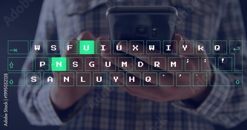 Typing man in blue-white plaid shirt holding smartphone indoors, virtual keyboard with green keys