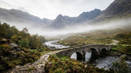 Misty mountain valley with an arched bridge, scenic travel and nature concept featuring soft fog, layered peaks and elegant stone architecture, peaceful atmosphere and winding depth create a romantic