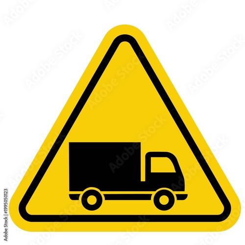 yellow road sign with truck