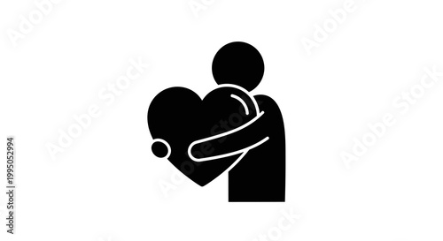A silhouette of a person embracing a large heart shaped object