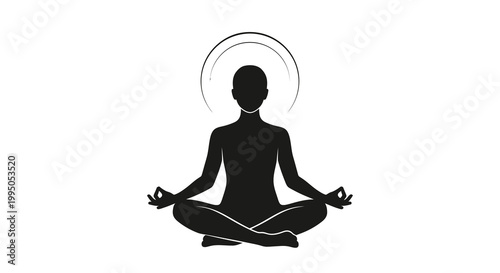Silhouette of a person meditating in the lotus position with a halo