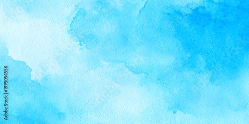 A soft and ethereal light blue watercolor background featuring delicate washes and organic textures a dreamy sky or serene water surface