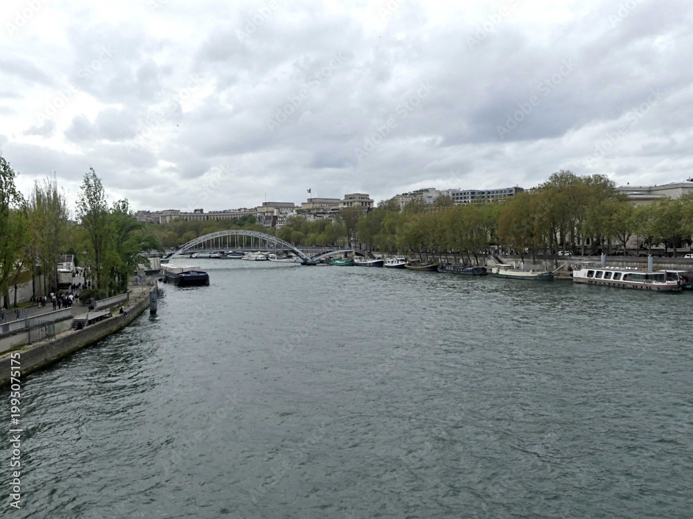 Obraz premium Paris, April 2026 : Visit of the magnificent city of Paris, Capital of France - View on different facades of buildings built by Baron Haussmann