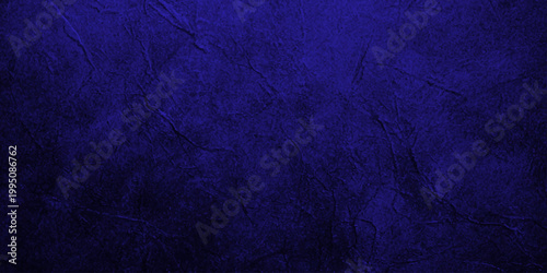 Abstract Deep Blue and Black Grungy Textured Background with Subtle Distressed Paint Splatter and Cinematic Dark Mood. aged metal, stone, or atmospheric smoke. deep cobalt blue and black color palette
