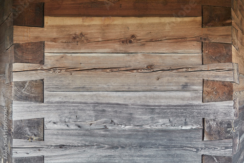 Принти на полотні Beautiful close-up of a wooden wall with an ornate corner joint.