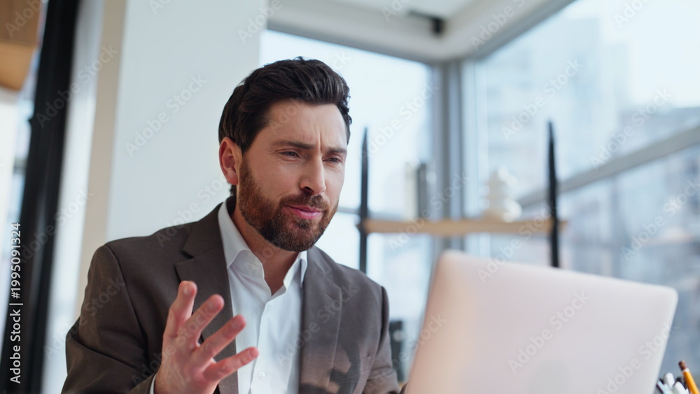 Fototapeta premium Positive executive waving laptop webcam starting video call workplace closeup.