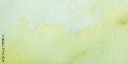 Pale lime green and cream watercolor wash texture on cold press paper with organic edges. A soft, abstract watercolor painting featuring light lime green and pale yellow pigments bleeding into white