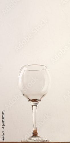 Wine glass, wine glass on rustic wooden surface and white background, selective focus.