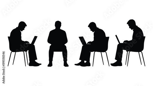 Silhouettes of four people seated and using laptops focused on their work