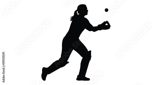 Silhouette of a female softball player preparing to catch a ball during a game