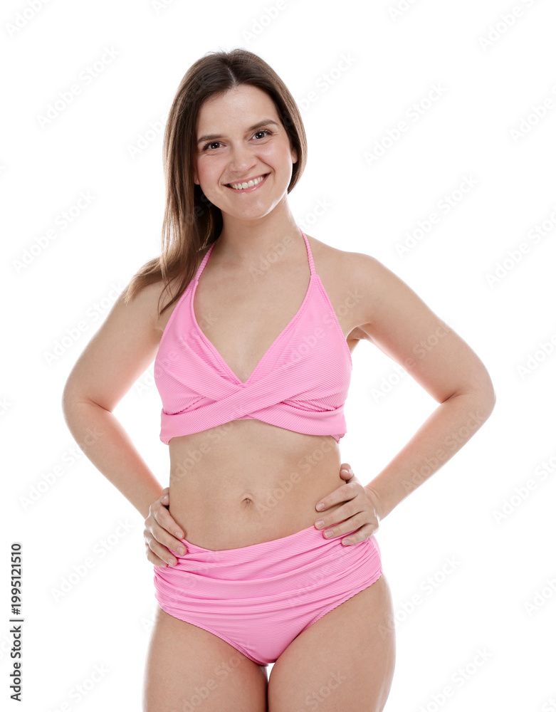 Fototapeta premium Woman in pink swimsuit on white background
