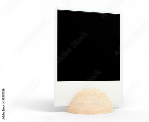 Single blank instant photo frame on a wooden hemisphere stand, side view mockup on transparent background