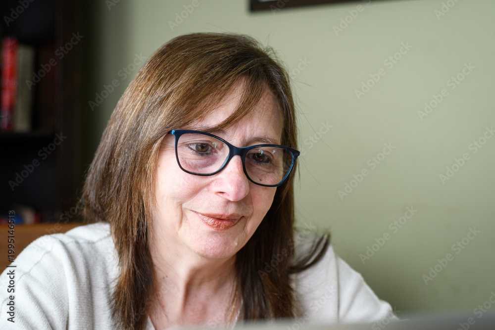 Fototapeta premium Senior woman portrait working