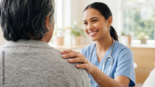 A geriatric nursing caregiver providing comfort and mental health support to an elderly person in a hospital.
