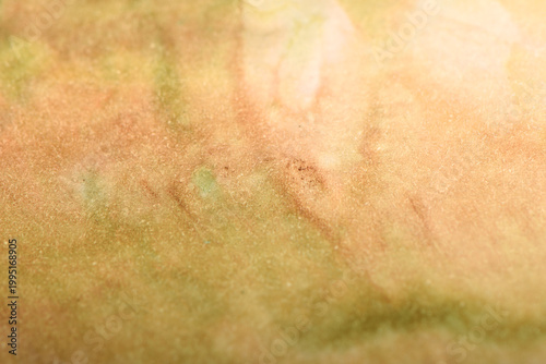 
Close-up art background of yellow stains on paper