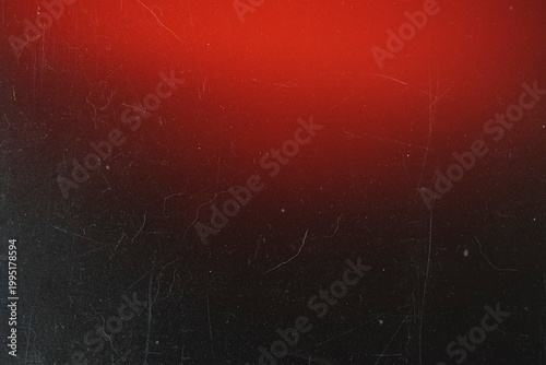 Quadro su tela Grungy black textured background with dust scratches and a bright red top gradie