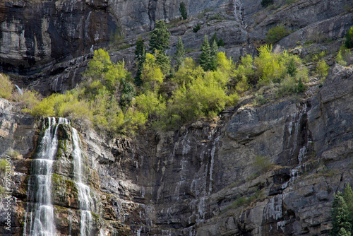 waterfall in the mountains, waterfall in Provo Canyon, Utah; Spring in Utah, trees above a waterfall