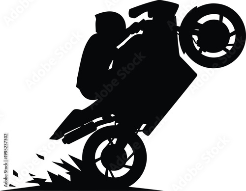 Black silhouette of a motorcyclist doing a wheelie