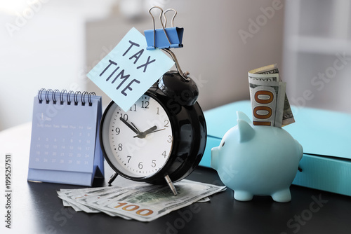 Alarm clock with text TAX T...