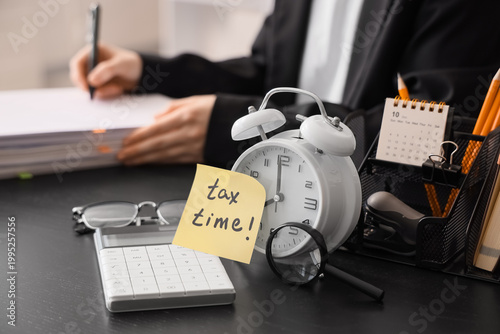 Alarm clock with text TAX T...
