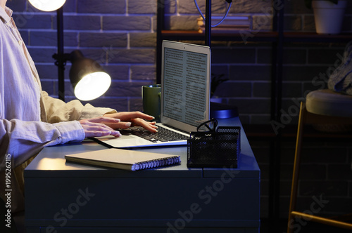 Female writer editing text ...