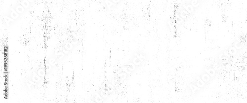 Black speckles and smudges on a white textured surface grunge background abstract distressed