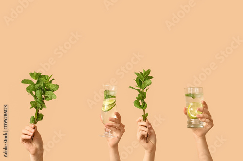 Female hands with glasses o...