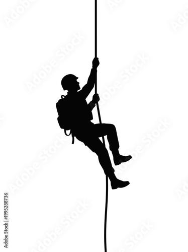 A person climbing a rope. A person is silhouetted against a monochrome backdrop, grasping tightly to ascend