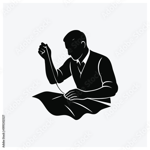 Silhouette of a man reading a paper or document, studying, or writing.