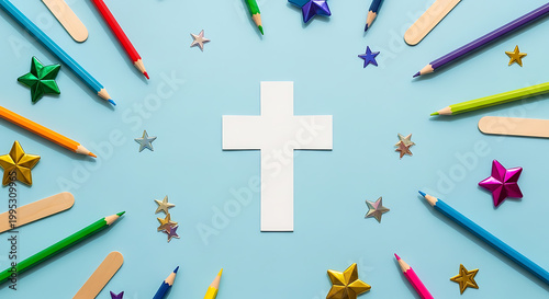 Religious back to school background with cross and art supplies