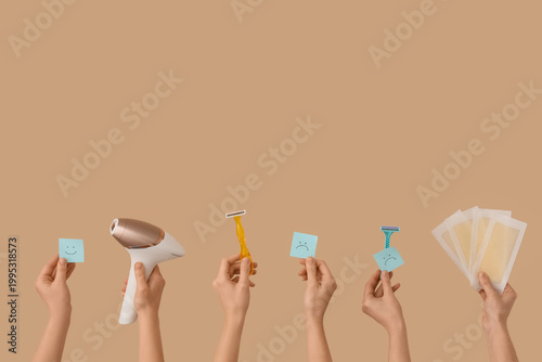 Many female hands with phot...