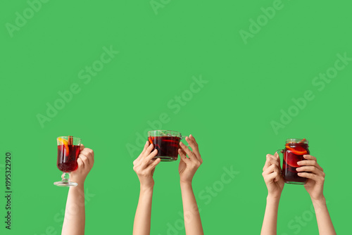 Female hands with cup, glas...