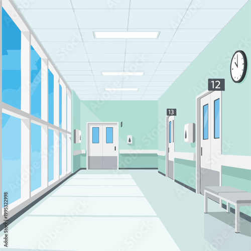 A hospital corridor with mint green walls and white trim