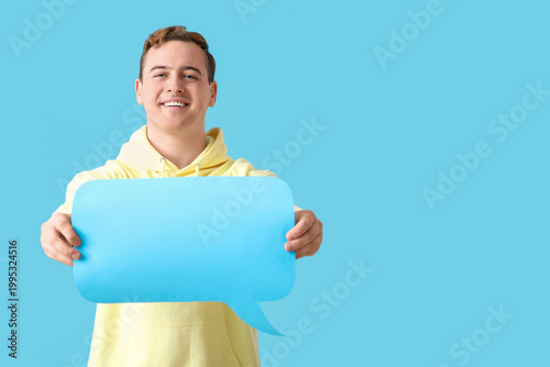 Young man with blank speech...