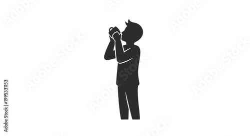 Silhouette of Man Drinking from Bottle.