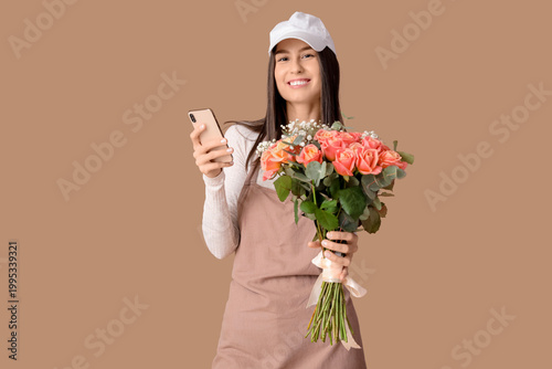 Young delivery woman with b...