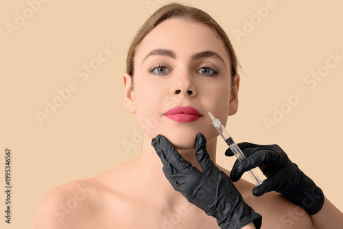 Beautiful young woman recei...